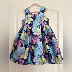 LULURAIN Floral Girls Dress. 
Back zipper and a bow with interior lining.